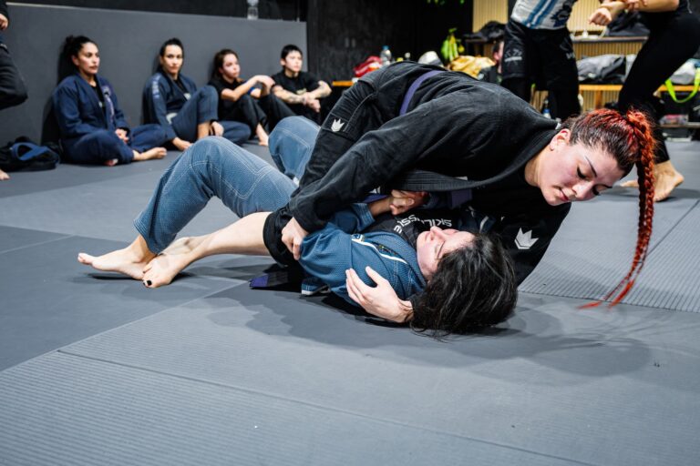 Dynamic Brazilian Jiu-Jitsu training session in Buenos Aires focusing on grappling techniques.